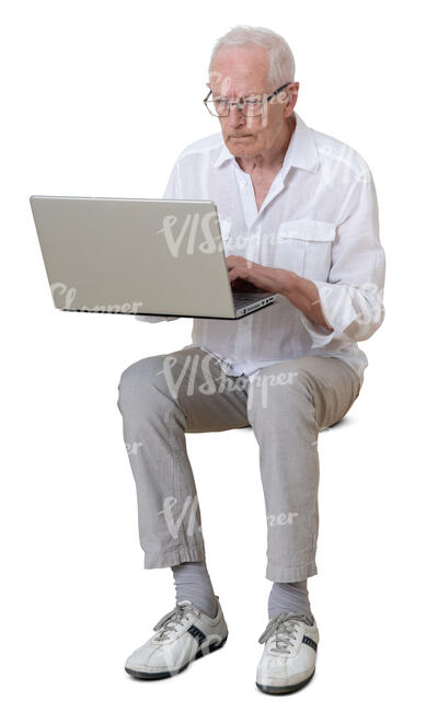 cut out older man sitting and working with laptop