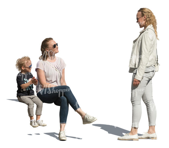 cut out woman and a child sitting and talking to woman standing beside them