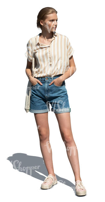 cut out young woman in denim shorts standing