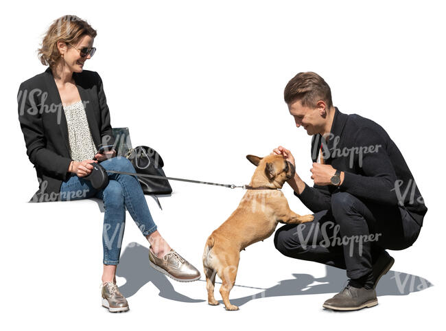 cut out man and woman sitting and petting  a small dog