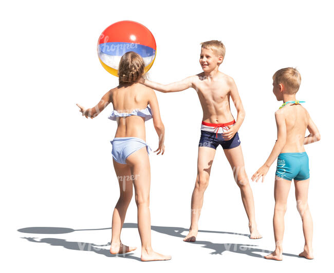 three cut out kids playing with a ball at the beach