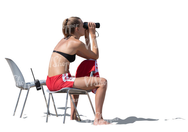 cut out lifeguard sitting and looking with binoculars