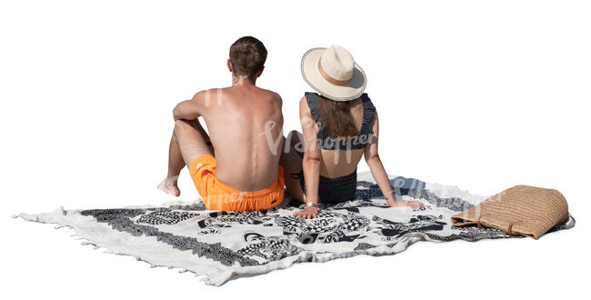cut out man and woman sitting on the beach
