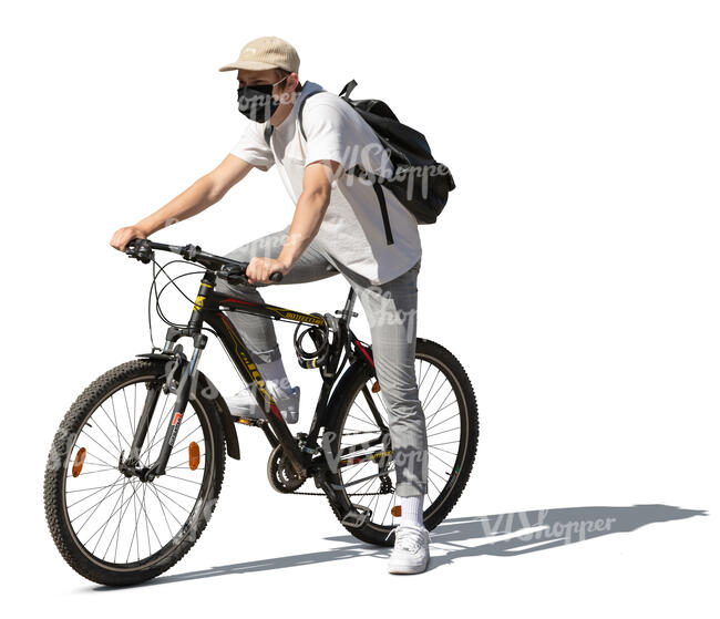 cut out young man with a face mask riding a bike