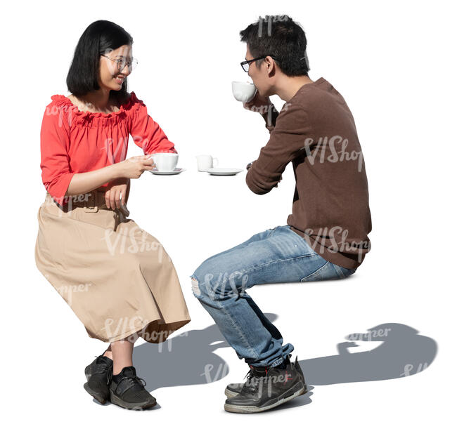 cut out asian man and woman sitting in a cafe and drinking coffee