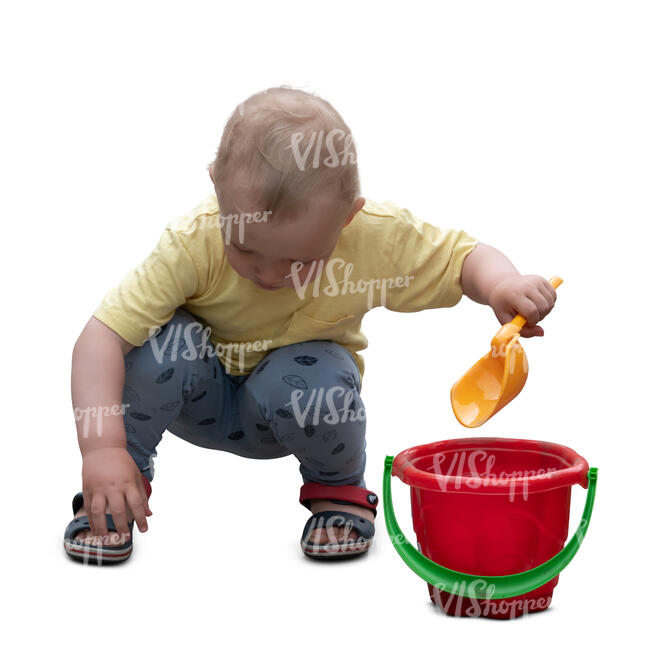 cut out little boy squatting and paying