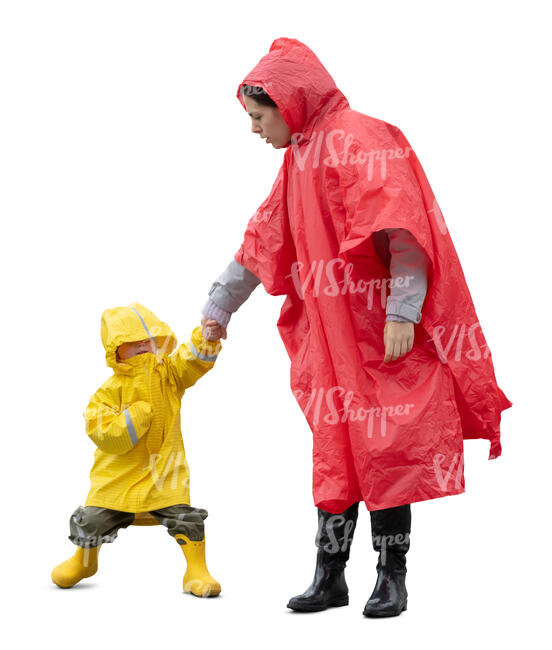 mother and son in raincoats standing hand in hand