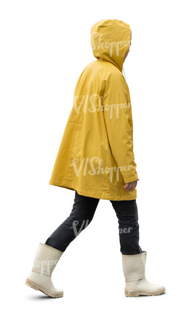 cut out woman in a yellow rain coat walking