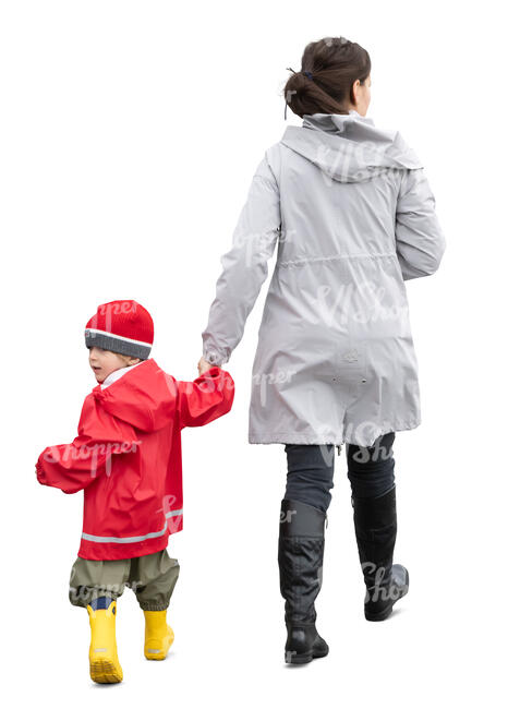 cut out mother and son walking hand in hand on in autumn