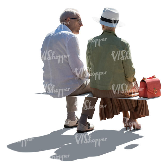 two cut out backlit elderly people sitting and talking