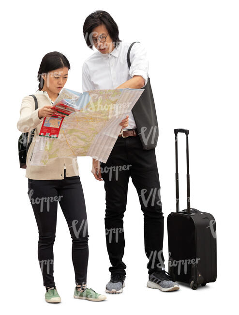 cut out asian tourists standing and looking at a city map