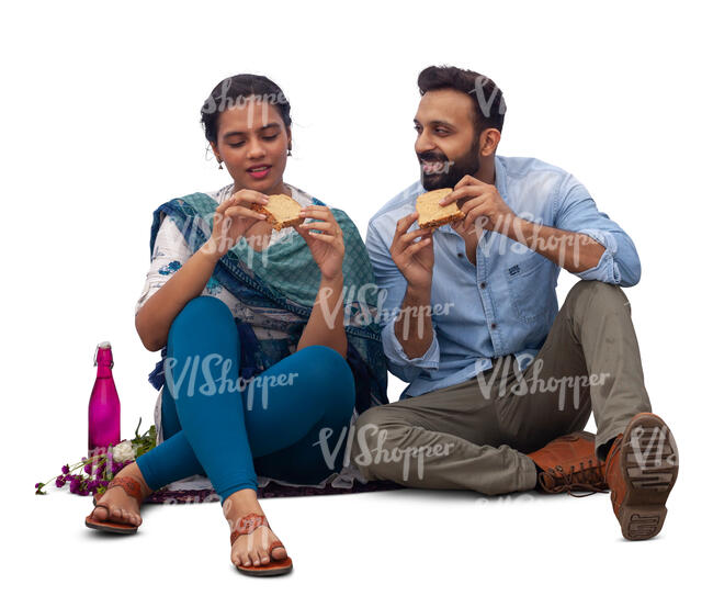 cut out indian man and woman sitting and eating sandwiches