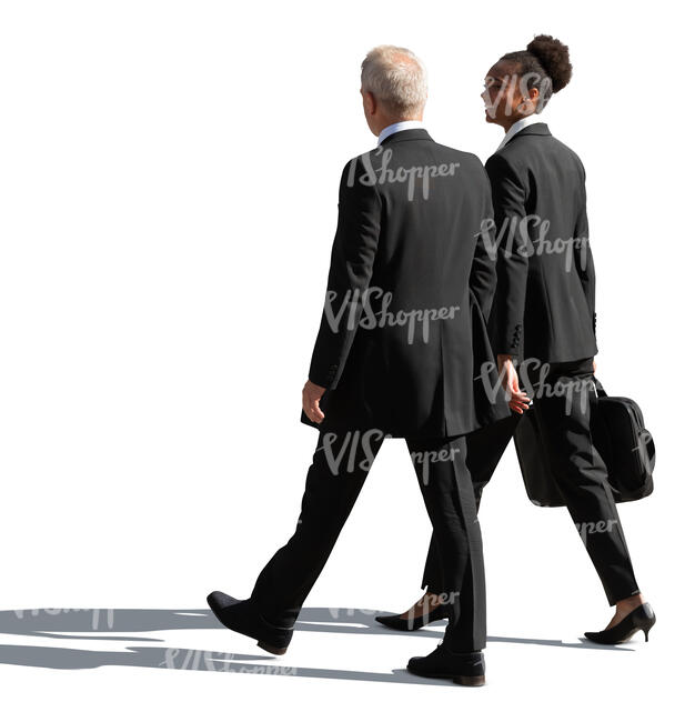 two cut out businesspeople walking