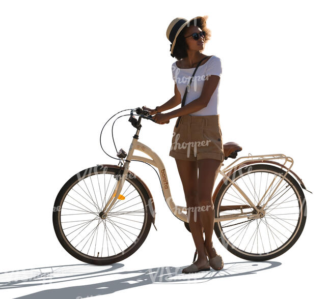 cut out backlit black woman with a bicycle standing