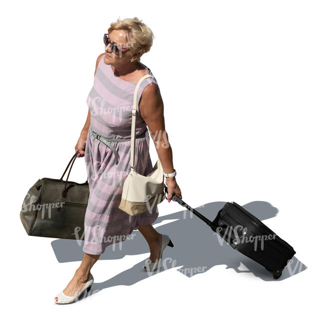 cut out older lady with travelling bags walking seen from above