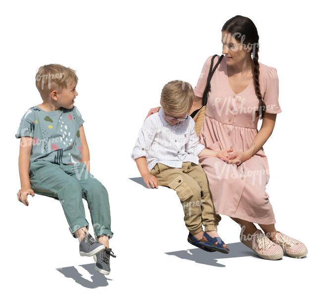 cut out woman and her two sons sitting and talking