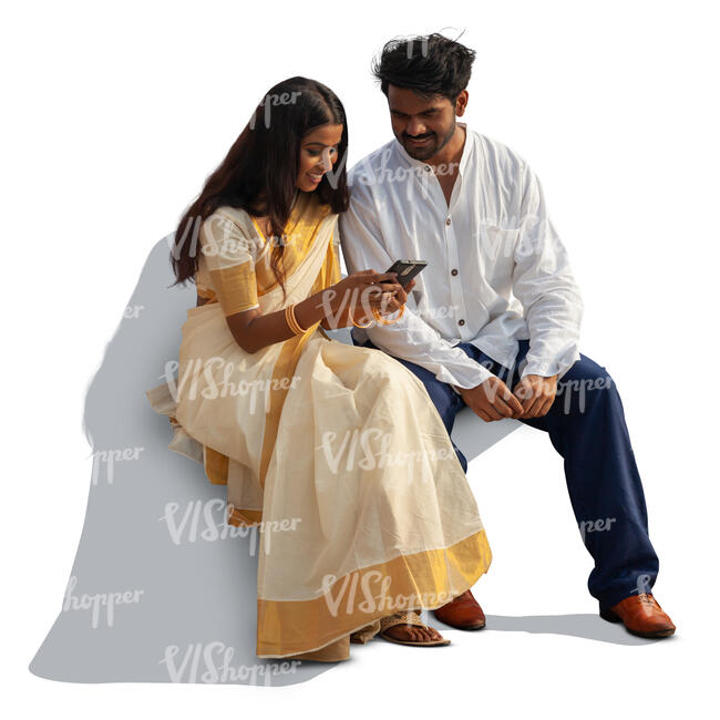cut out indian man and woman sitting and watching smth from a phone together