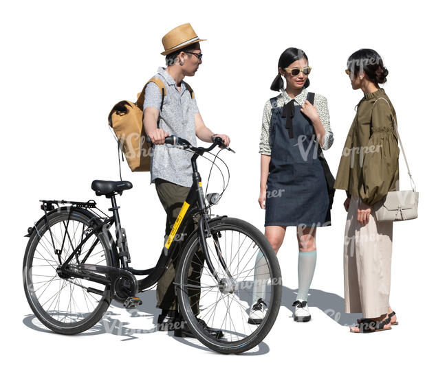 cut out man with a bicycle standing and talking to two women