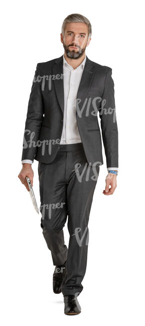 cut out man in a grey suit walking