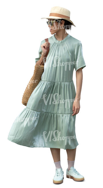 cut out asian woman in a green summer dress standing