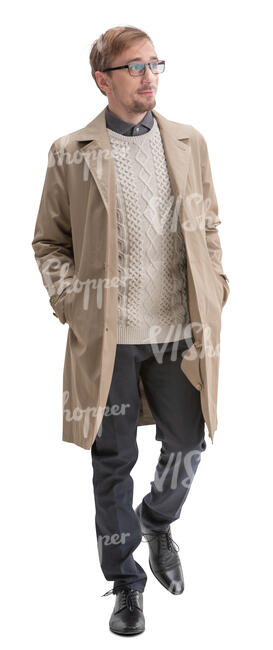 cut out man in a beige overcoat walking