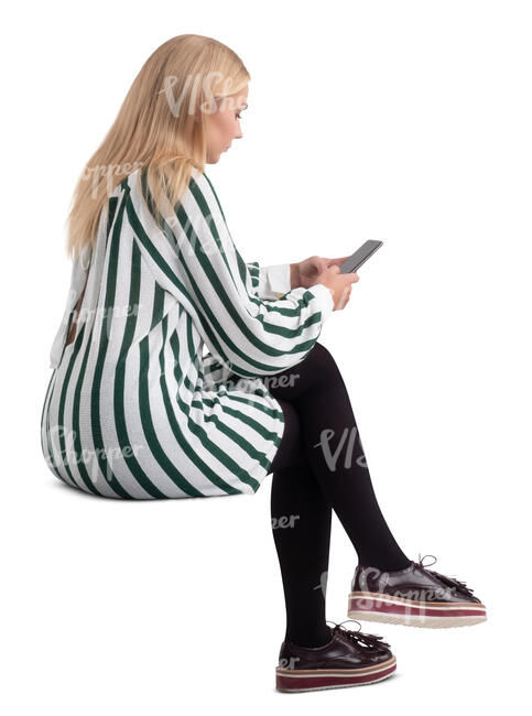 cut out woman with a phone in her hand sitting