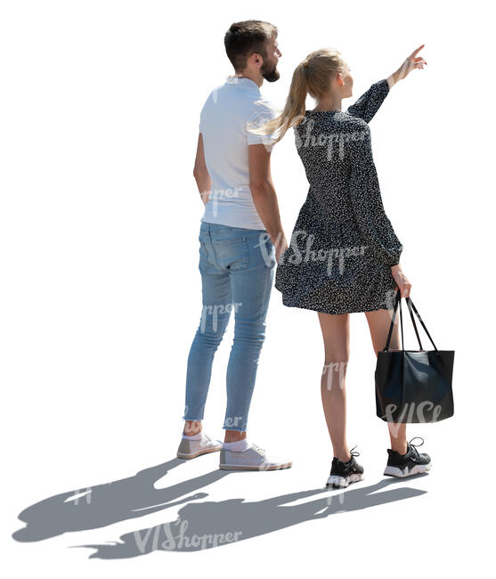 cut out backlit man and woman standing and looking at smth