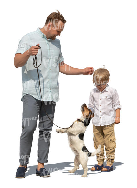cut out father and son standing and playing with a dog