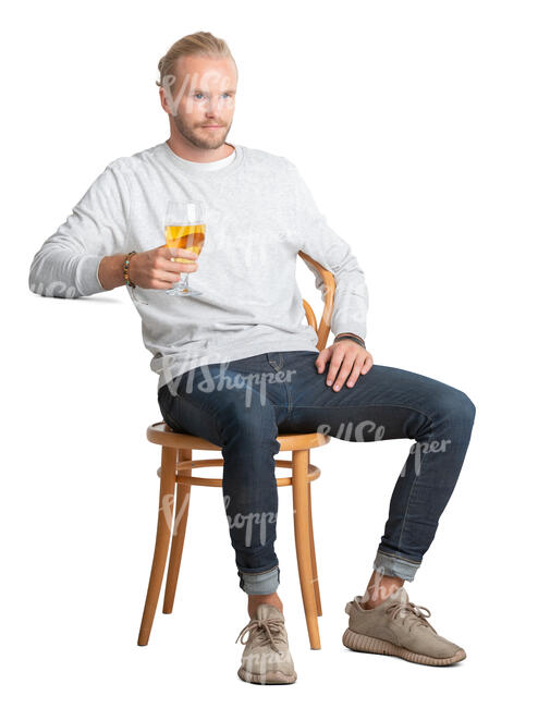 cut out man sitting and drinking beer