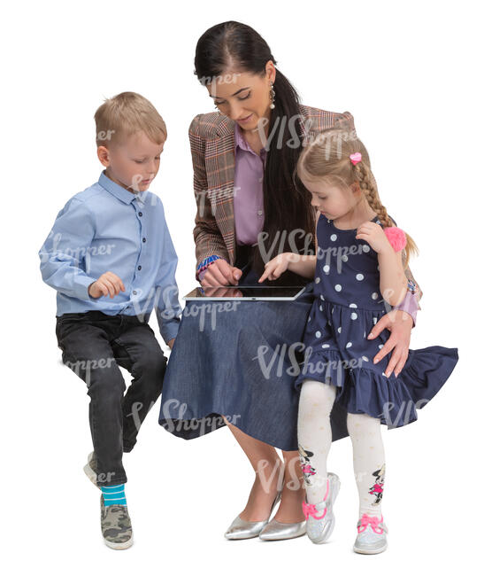 cut out woman with two kids sitting and watching smth from a tablet