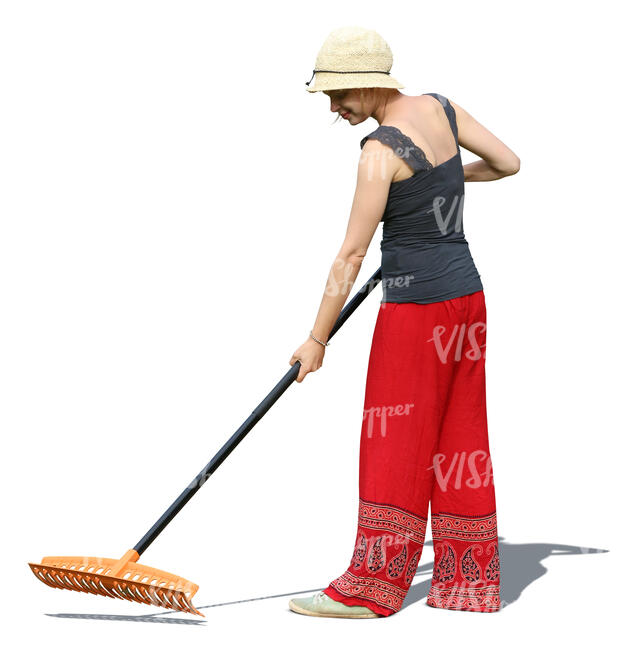 woman raking in a garden