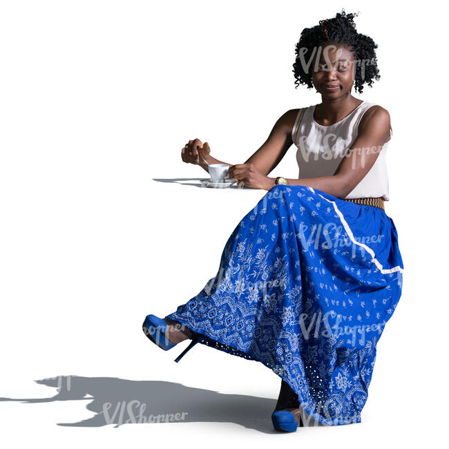 african woman sitting in a cafe