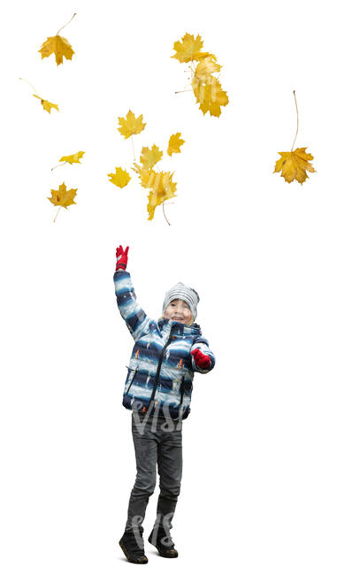 cut out little boy playing with fallen leaves