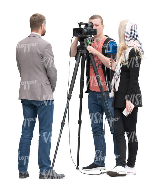 cut out television crew filming an interview