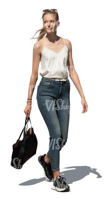 cut out young woman walking on a sunny summer day