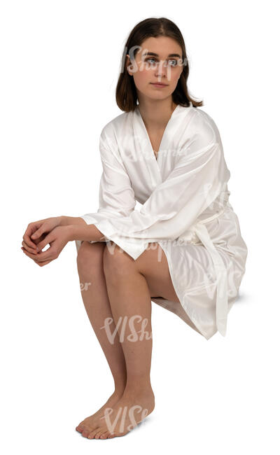 cut out woman in a white bathrobe sitting