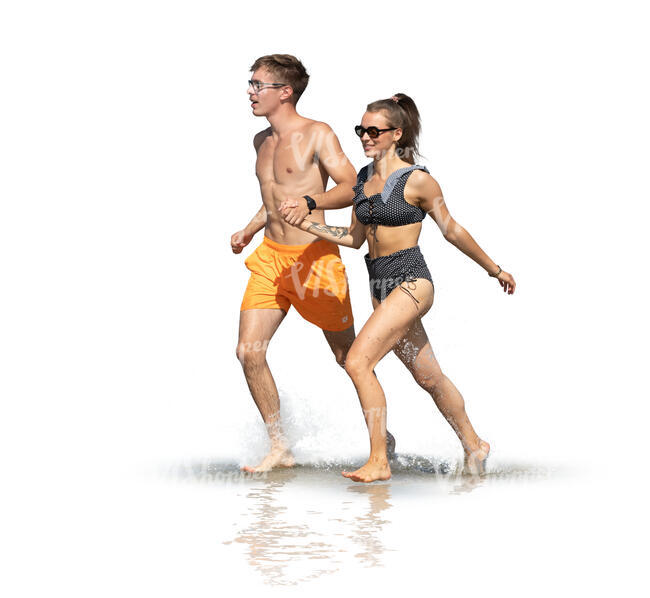 two cut out young people running on the beach