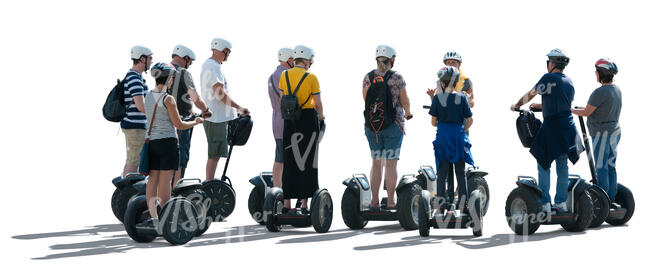 cut out backlit group of people riding segways
