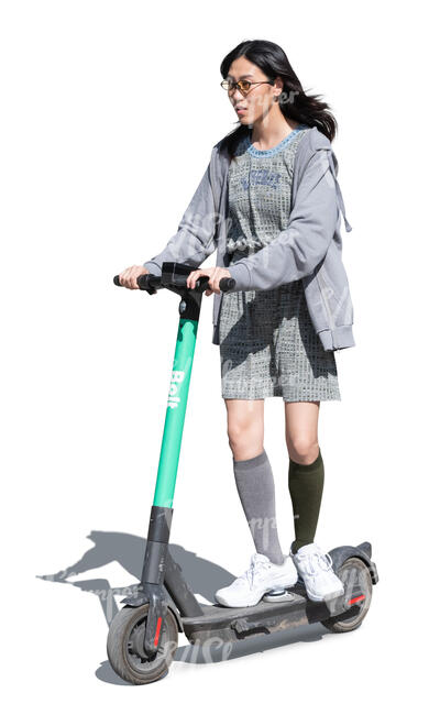 cut out young asian woman riding a scooter