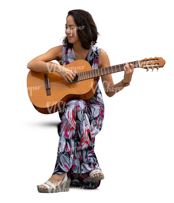 cut out woman sitting and playing a guitar