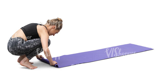 cut out woman packing her things after yoga workout