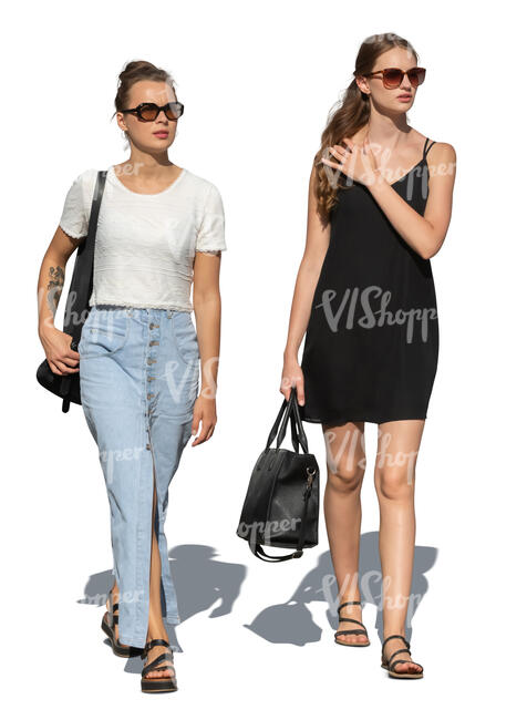 two cut out young women walking