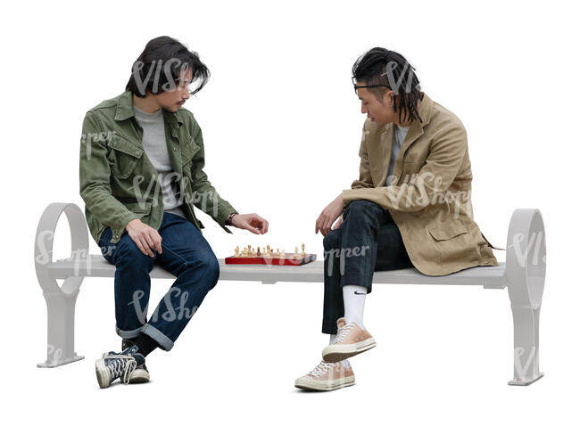 two cut out asian men sitting and playing chess in the park