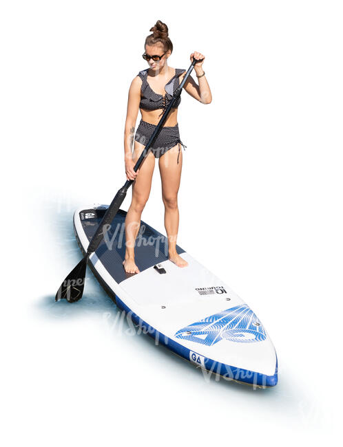 cut out woman paddleboarding seen from above