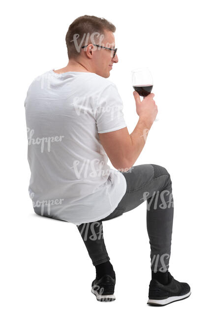 cut out man sitting and drinking wine