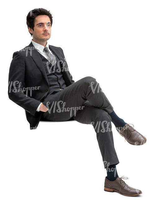 cut out man in a formal black suit sitting