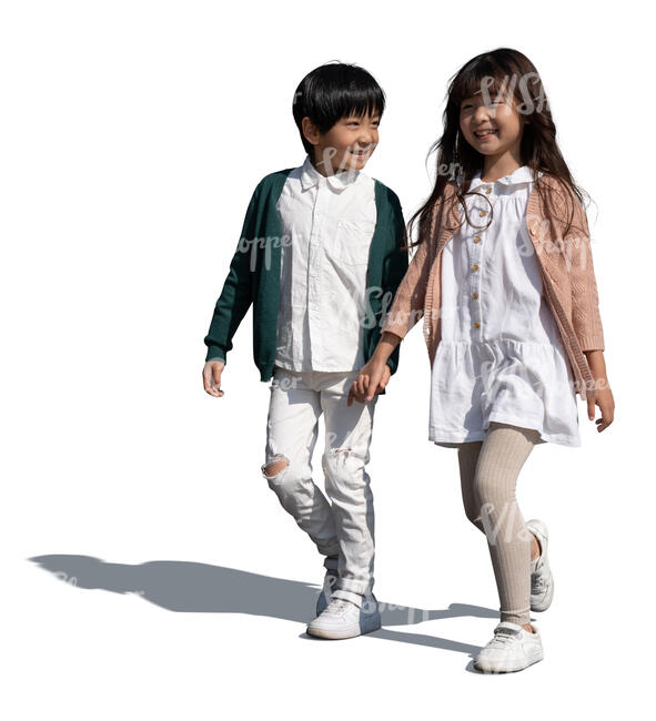 two cut out asian kids walking happily hand in hand