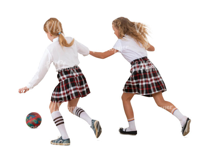 two cut out schoolgirls playing football
