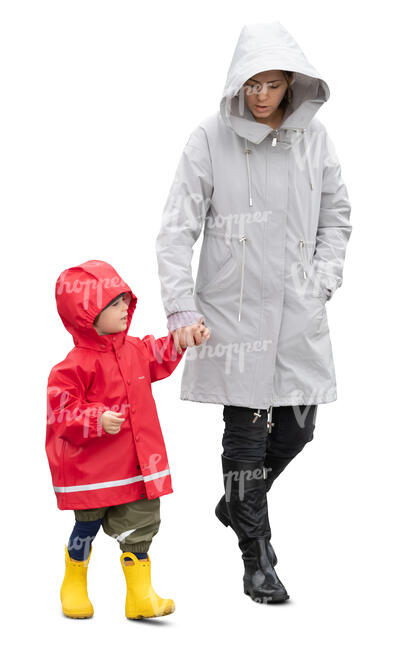 cut out mother and son walking hand in hand on a rainy autumn day