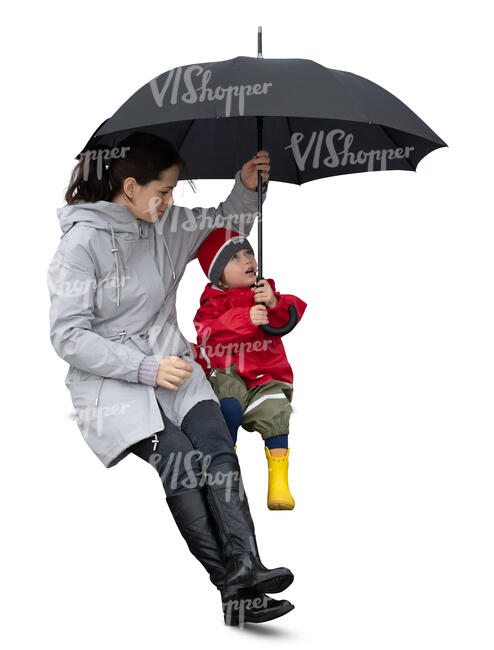 cut out woman sitting with her son under an umbrella